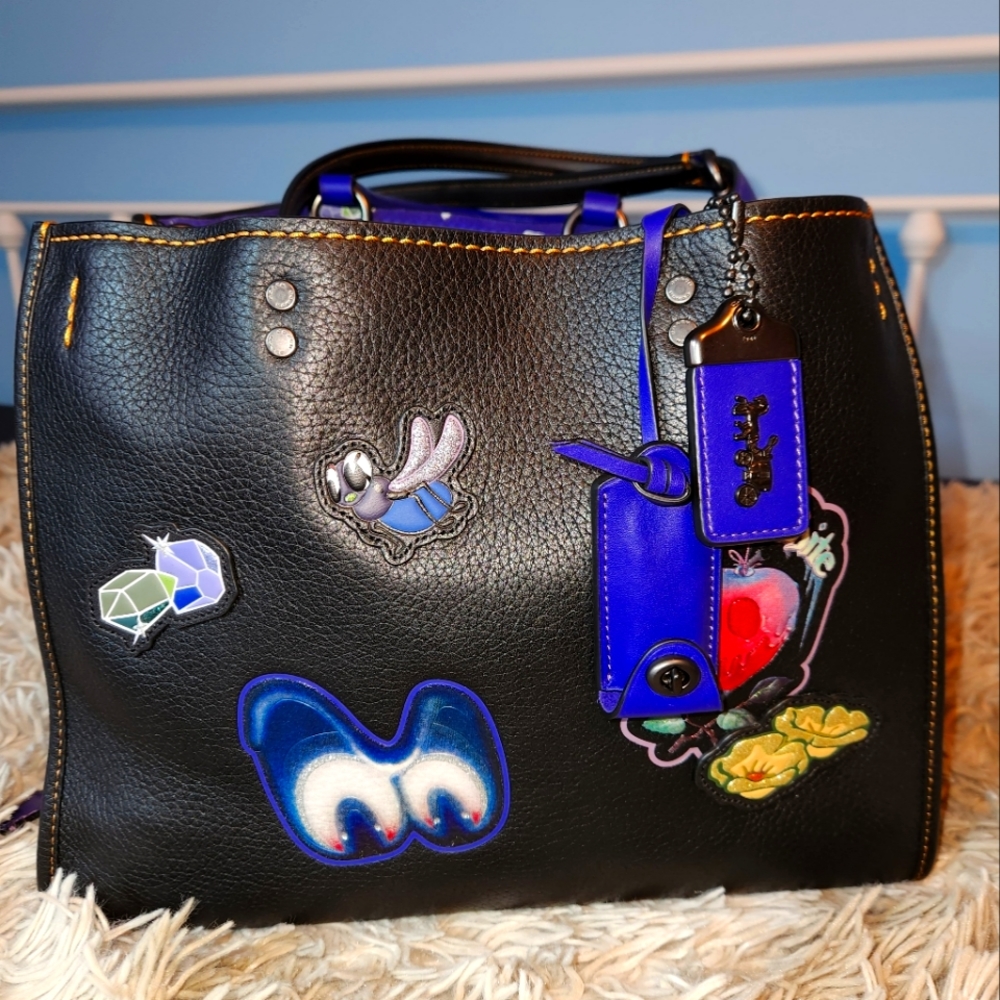 COACH RARE Dark Fairytale collection Disney Rogue 30